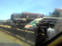 Xe cứu thương va chạm mạnh với xe tải trên QL1A, 2 lái xe bị thương nặng