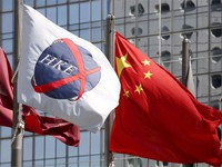 Trung Quốc: Đầu tư ra nước ngoài giảm gần 50 trong 6 tháng đầu năm 2017