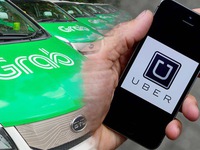 Bộ Giao thông yêu cầu xe Uber, Grab dán logo: Tài xế nói gì?