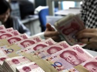 Ngân hàng Trung Quốc đe dọa trừng phạt những người quay lưng với tiền mặt