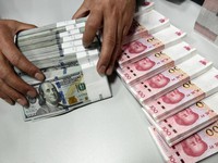 Trung Quốc: Tỷ giá NDT/USD ở mức cao nhất trong hơn 2 năm