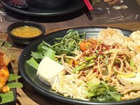 Độc đáo hương vị lá khì-hụt trong ẩm thực Lào