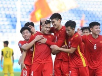 Vietnam book quarter-final place with 2-0 rout of Malaysia
