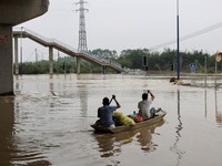 Trung Quốc khẩn trương cứu hộ người dân trong lũ
