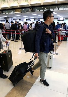 Đoàn phóng viên Hàn Quốc lên máy bay tới Triều Tiên