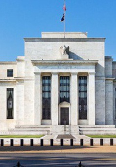 Chứng khoán Mỹ đạt mức kỷ lục sau thông báo của Fed