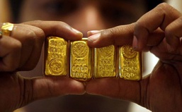 Giá vàng thế giới trượt khỏi mốc 1.800 USD/ounce