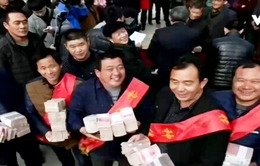 Nông dân Trung Quốc nhận gần 450.000 USD tiền thưởng Tết