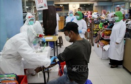 Số ca nhiễm mới COVID-19 trong ngày cao kỷ lục tại Indonesia