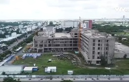 Bệnh viện cũ quá tải, bệnh viện mới xây mãi chưa xong