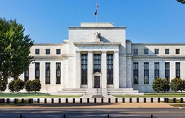 Chứng khoán Mỹ đạt mức kỷ lục sau thông báo của Fed