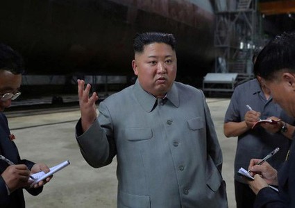 North Korean leader inspects newly-built submarine