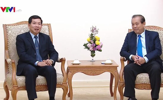 Phó Thủ tướng Trương Hòa Bình tiếp Chánh án Tòa án nhân dân Tối cao Lào