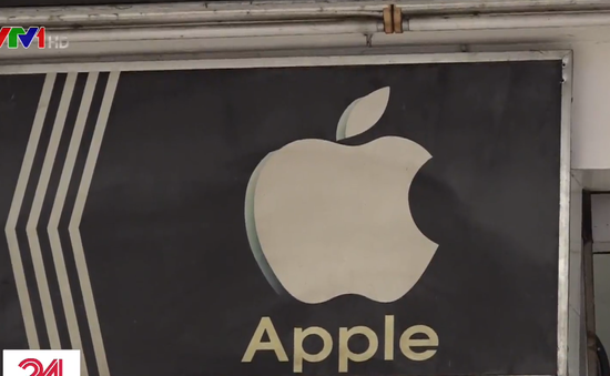 Nhiều cửa hàng điện thoại ở Việt Nam vẫn sử dụng logo Apple