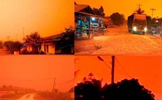 Bầu trời Indonesia chuyển đỏ do khói cháy rừng