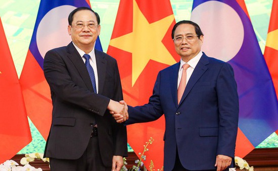 Thủ tướng Phạm Minh Chính gặp làm việc với Thủ tướng Lào Sonexay Siphandone