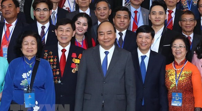 Prime Minister meets overseas Vietnamese joining Homeland Spring programme