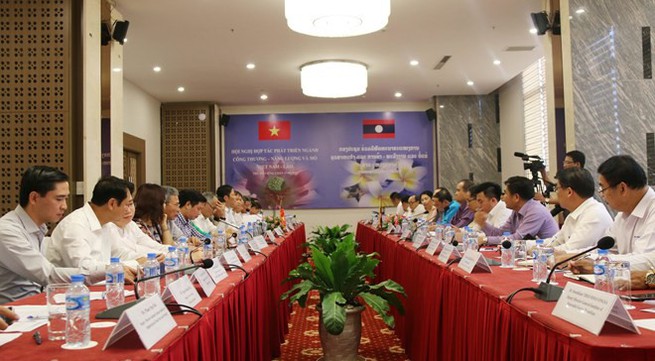 Vietnam, Laos boost cooperation in trade-industry, energy, mining