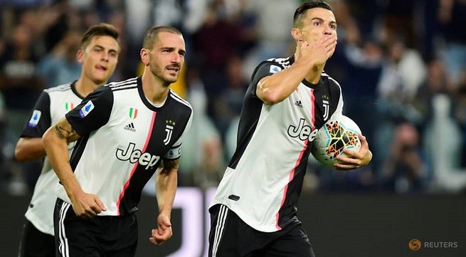 Ramsey and Ronaldo earn Juventus nervy win over Verona