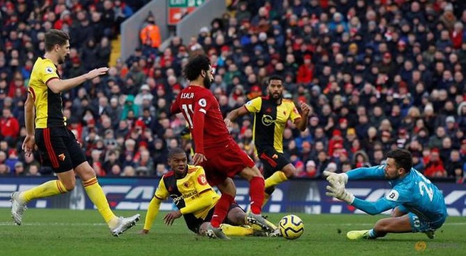 Salah strikes twice as Liverpool sink struggling Watford