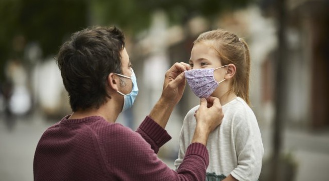 WHO urges people to wear face masks during Christmas gatherings