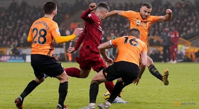Liverpool move towards title with 2-1 win at Wolves