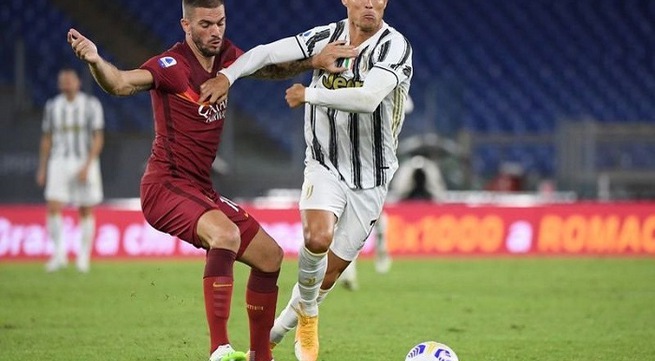 Ronaldo double earns point for 10-man Juventus at Roma