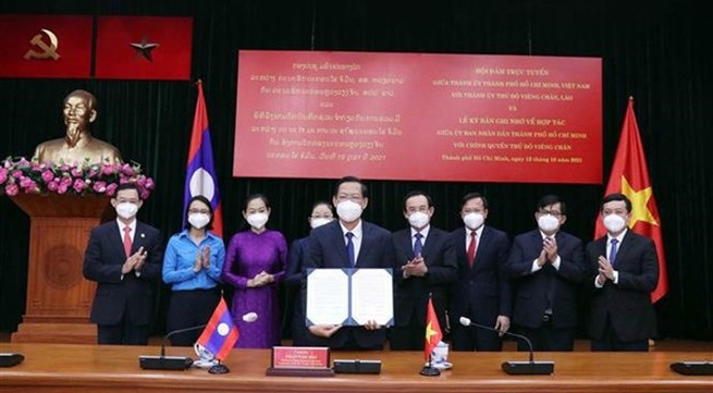 Ho Chi Minh City, Vientiane seal MoU for cooperation during 2021 - 2025