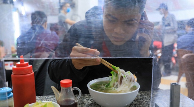Indoor eating, museums and bus services reopen as Hanoi return to normal