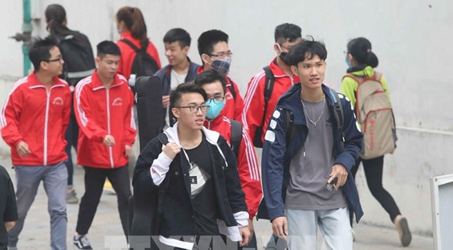 Universities plan to receive students for in-person learning after Tet