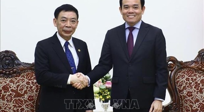 Deputy Prime Minister Tran Luu Quang receives Lao Minister of Home Affairs